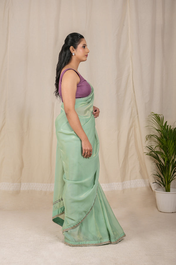 Beautiful Shimmer Net Saree in Aqua Blue, Adorned with a Golden Shine and a Stunning Silver Dori Border